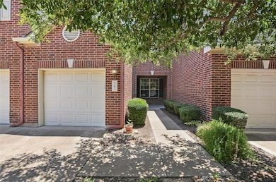 View of front of property featuring brick siding,