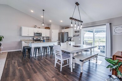 Look at the beautiful rich colored floors and tasteful light fixtures