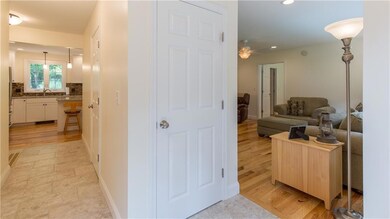 Entry door leads into hallway and...