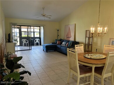 Living room with lofted ceiling