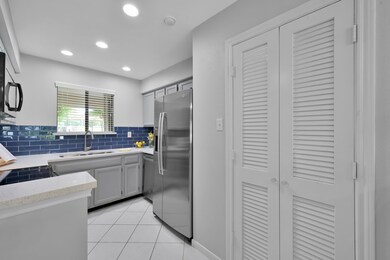 New quartz countertops with subway tile backsplash