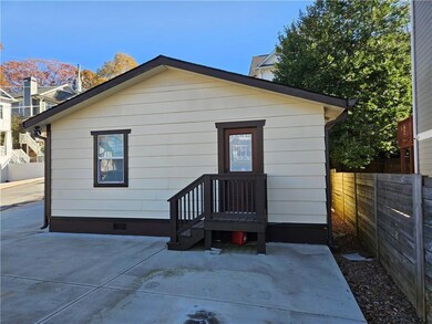 Back of property featuring a patio area, fence, an