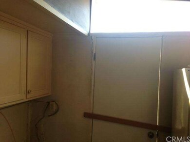 CRACK NEAR TOP LEFT SIDE OF DOOR 