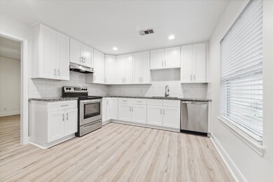 1707 W 43rd St, Houston, TX 77018 - photo 7