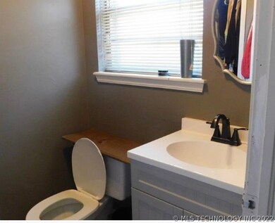 HALF OF THE BATHROOM