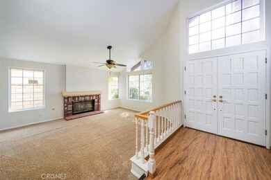 Living Room with Fireplace & Ceiling Fan