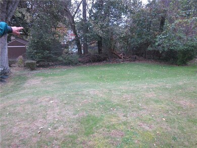rear yard another view. Property goes down to the 