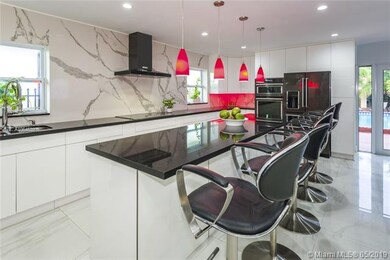 Portion of kitchen opening into pool patio