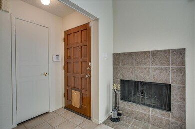 Front entrance and fireplace