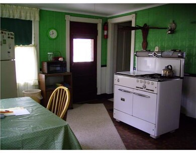 Kitchen. Tin ceiling and upper walls.