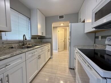 26 Golfs Edge unit A, West Palm Beach, FL 33417 - photo 2