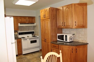 Oversized electric stove with warming drawer is pe