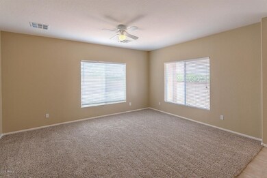 14841 W Desert Hills Dr-large-007-19-Fam