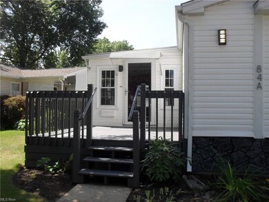 Beautiful newly stained front porch and new handra