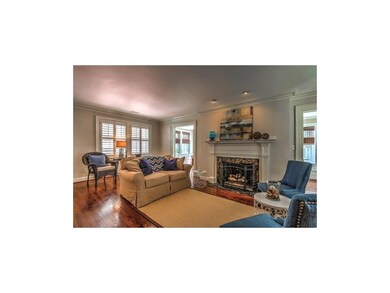Living Room with Marble fireplace surround. Gas lo