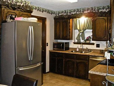 Kitchen. Updated counter tops, appliances, floorin