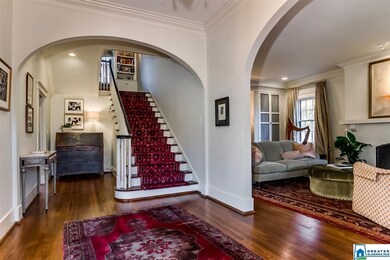formal entry, showing charming arched entries to f