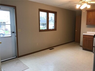 Front door enters into kitchen