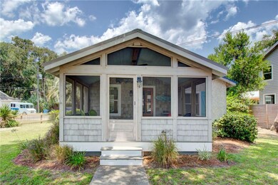 Updated front porch with cedar shake is a perfect