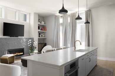 Kitchen with light wood-style flooring, a sink, a