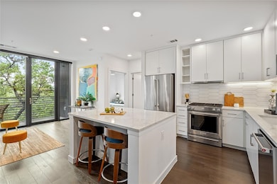 Kitchen featuring open shelves, a wealth of natur