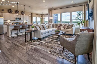 Open concept main level. Photos are from a model a