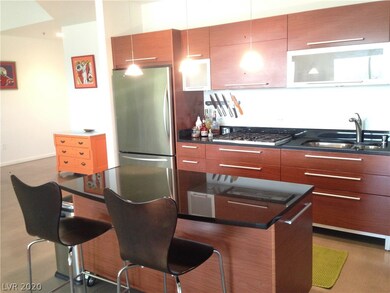 Modern kitchen:  European style cabinetry, stainle