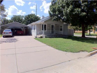 2 car garage with 2 car carport