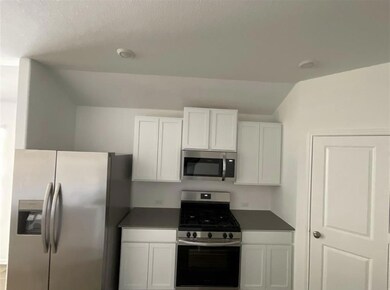 Kitchen featuring stainless steel appliances, lof