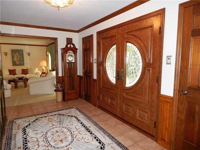 Entry/Foyer. The custom double front door is by Je