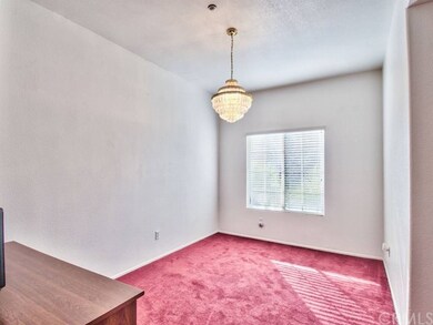 Separate Formal Dining Room with a stunning chande