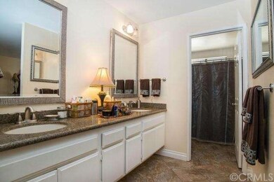 Beautifully remodeled bathroom with granite counte