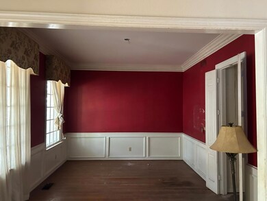Spare room featuring hardwood / wood-style floorin