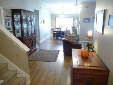 A look as you enter the home from the foyer down to the dining room in this open floor plan.