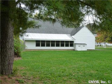 Exterior Back. Deep lot-Spacious Enclosed porch.