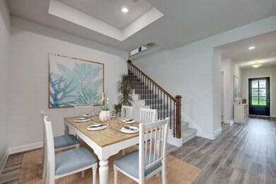 Upon entering, you are greeted by a welcoming entryway that gracefully guides you to the elegant dining room, creating a seamless flow for entertaining and enjoying meals with family and friends.