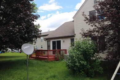 Back Yard w/ Deck and Trees.