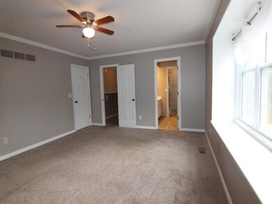 MASTER BEDROOM - Carpet - Ceiling Fan - Walk-In Cl