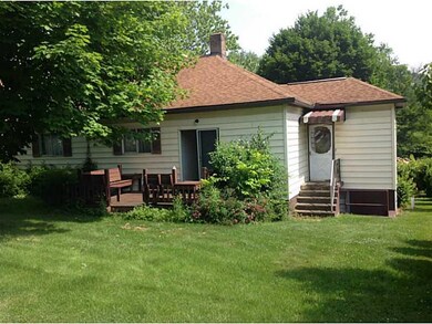 Exterior Back. Nice backyard with deck off kitchen