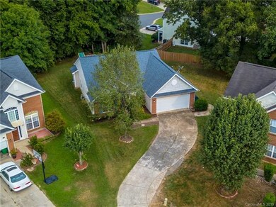 Oversized cul-de-sac lot backs up to trees to give