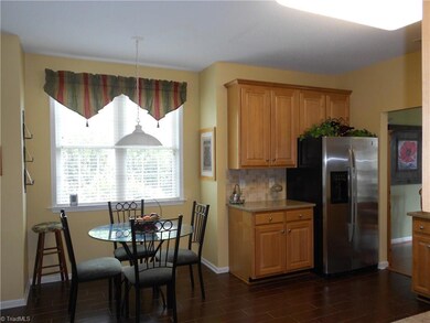Stainless steal refrigerator stay with the house. Notice the updated back splash, counter top and flooring.