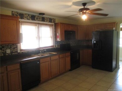Huge kitchen with plenty of cabinet space, all app