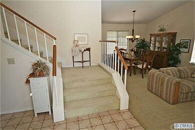 Step down living room with dining area beyond