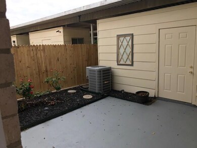 Rear patio with outside storage shed
