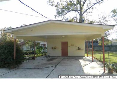 Double Detached Carport w/ Storage Room