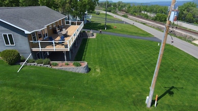 Front Yard with Spacious 60x16 Deck & Patio