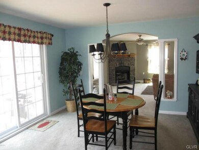 DINING ROOM WITH SLIDERS TO BACK DECK!