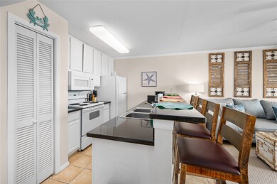 Lovely granite counters with full size appliances.