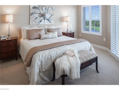 Carpeted bedroom with baseboards