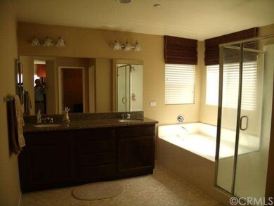 Master bath with double sinks and granite counter 